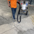 Worker filling cracks using the AST GMP-050 unit