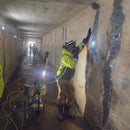 Working repairing concrete with AST RMP 317  epoxy crack injection system