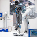 Graco Precision Shot Metering System & Controller Integrated with a Robot with White Arm