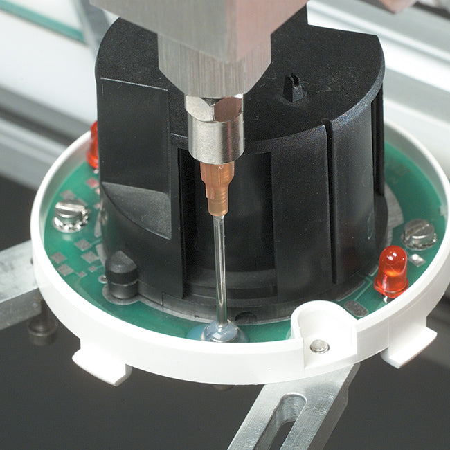 Positive displacement dispensing valve application shot